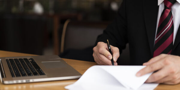 man-office-writing-paper